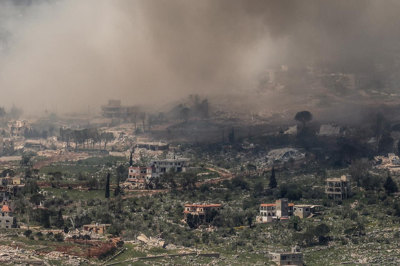Smoke and dust engulf a town following Israeli explosions destroying buildings and homes, in southern Lebanon near the border as seen from the Upper Galilee in northern Israel, April 27, 2026. (AFP Photo)