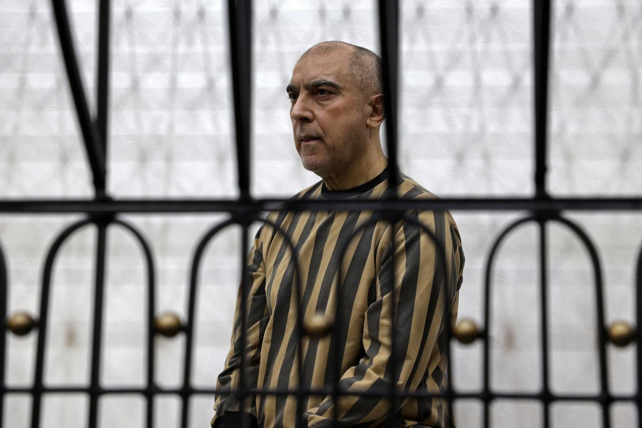 Former head of political security in south Syria's Daraa province, Atif Najib attends the first trial session at the Palace of Justice, in Damascus on April 26, 2026. (AFP photo)