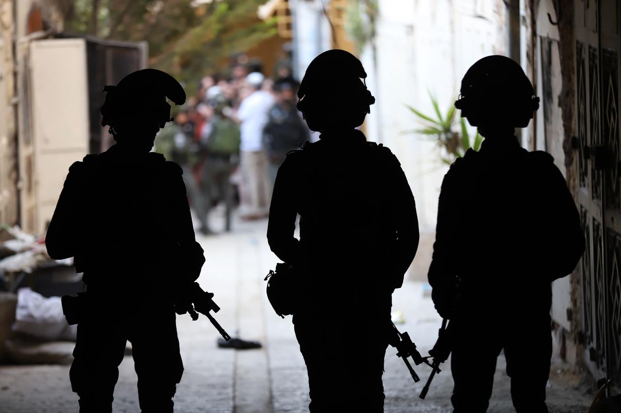 Israeli forces carry out a raid imposing security measures and restricting the movement of Palestinians in the Old City area of Hebron, West Bank, Palestine, April 25, 2026. (AA Photo)