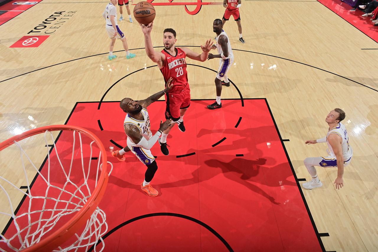 Alperen Sengun #28 of the Houston Rockets drives to the basket during the game against the Los Angeles Lakers during Round One Game Four of the 2026 NBA Playoffs on April 26, 2026 at the Toyota Center in Houston, Texas. (AFP Photo)