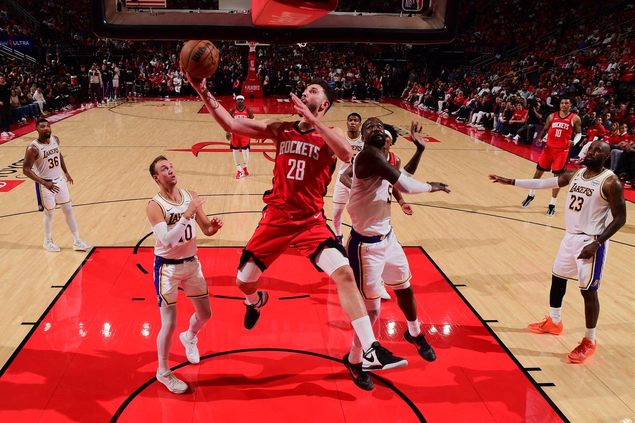 Alperen Sengun #28 of the Houston Rockets drives to the basket during the game against the Los Angeles Lakers during Round One Game Four of the 2026 NBA Playoffs on April 26, 2026 at the Toyota Center in Houston, Texas (AFP Photo)