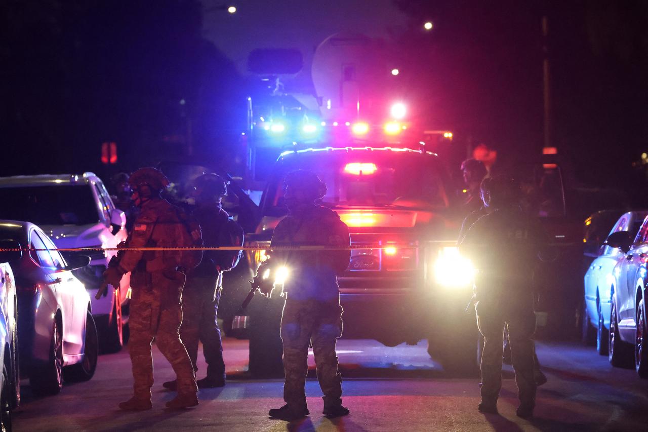An FBI tactical team arrives in armored vehicles outside a house associated with the suspected White House Correspondents’ Dinner shooter as in Torrance, California, US, April 25, 2026. (AFP Photo)