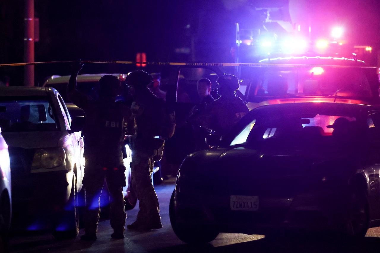 An FBI tactical team arrives in armored vehicles outside a house associated with the suspected White House Correspondents’ Dinner shooter as in Torrance, California, US, April 25, 2026. (AFP Photo)