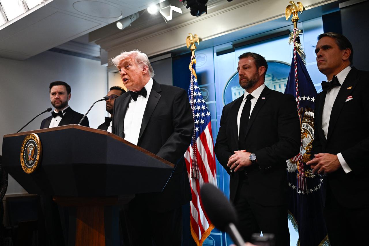 US President Donald Trump speaks, flanked by US Vice President JD Vance, FBI Director Kash Patel and US Secretary of Homeland Security Markwayne Mullin, during a press briefing in the Brady Briefing Room at the White House in Washington, DC, US, April 25, 2026. (AFP Photo)
