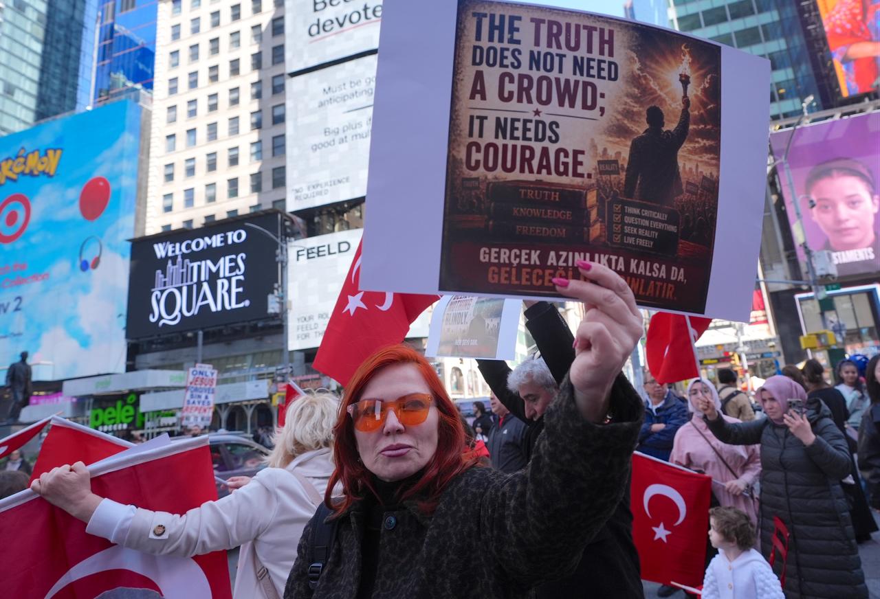 Members of the Turkish-American community gather at Times Square to protest a social media post by New York City Mayor Zohran Mamdani regarding the 1915 events during the Ottoman Empire and Karabakh, in New York, United States, on April 26, 2026. (AA Photo)