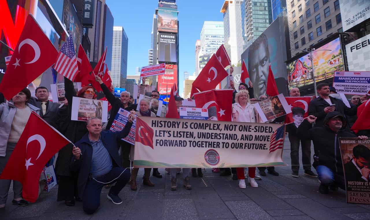 Members of the Turkish-American community gather at Times Square to protest a social media post by New York City Mayor Zohran Mamdani regarding the 1915 events during the Ottoman Empire and Karabakh, in New York, United States, on April 26, 2026. (AA Photo)