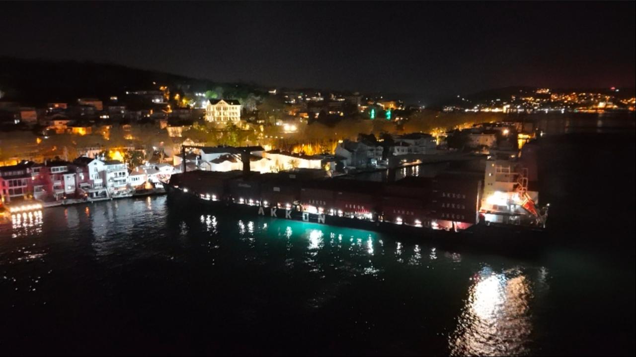 Aerial night view shows the KAPPA container ship near the shoreline in the Istanbul Bosphorus during rescue operations, April 28, 2026. (IHA Photo)