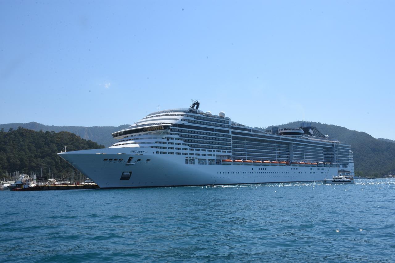 The Panama-flagged cruise ship MSC Divina docks at Marmaris Cruise Port, bringing thousands of tourists to the southwestern resort town of Türkiye, April 28, 2026. (AA Photo)
