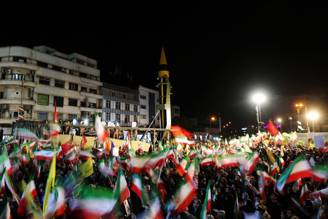 People gather at Enghelab and Vanak squares to participate in anti-US and anti-Israel demonstrations, waving Iranian flags and chanting slogans on April 21, 2026, in Tehran, Iran. (AA Photo)