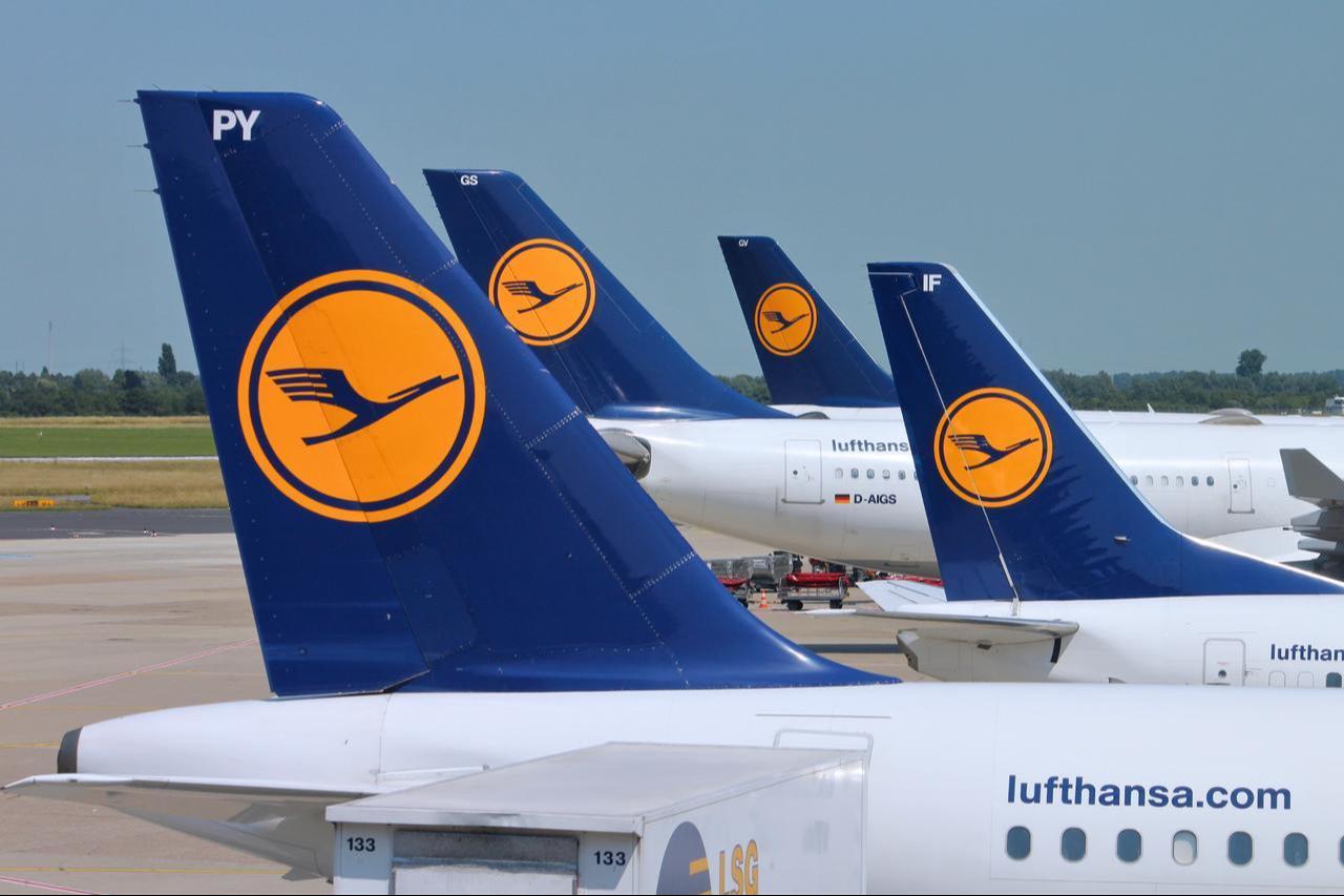 Multiple Lufthansa Group aircraft are parked at Dusseldorf Airport in Dusseldorf, Germany, July 8, 2013. (Adobe Stock Photo)