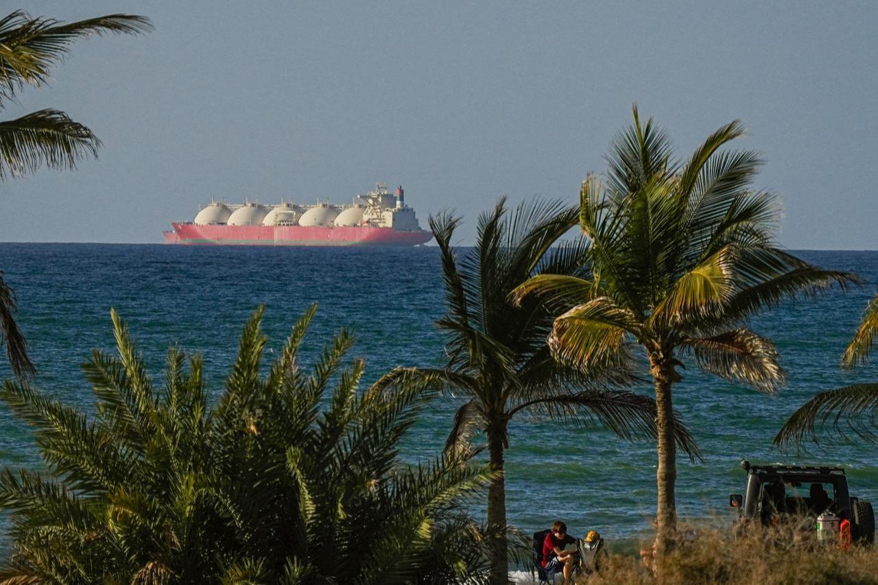 A view of the vessels passing through Strait of Hormuz following the two-week temporary ceasefire reached between the United States and Iran on the condition that the strait be reopened, seen in Oman on April 08, 2026. (AA Photo)