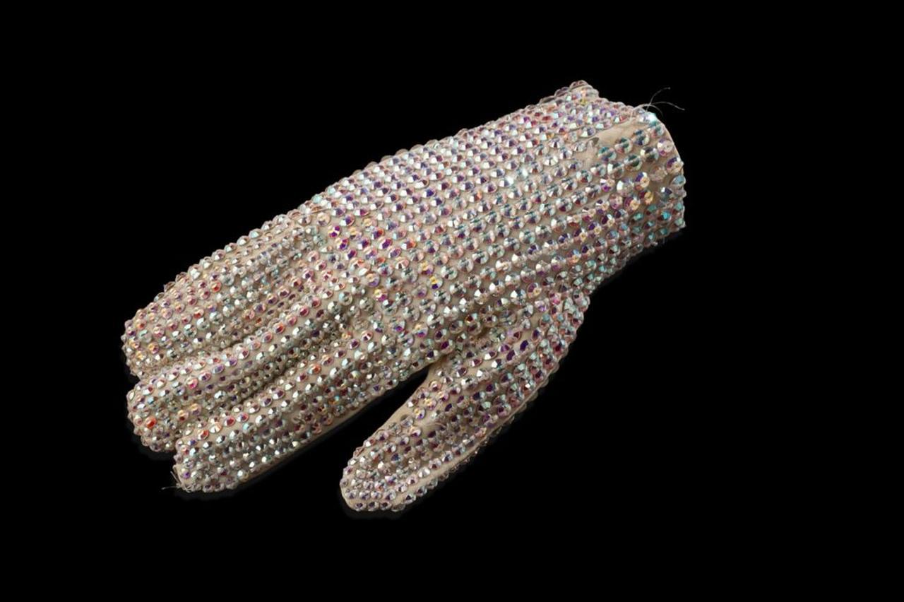 Crystal-studded stage glove attributed to Michael Jackson, believed to have been worn during rehearsals for “Billie Jean” and on the Bad World Tour, is set to lead the Aguttes auction in Paris. (Photo via Aguttes)