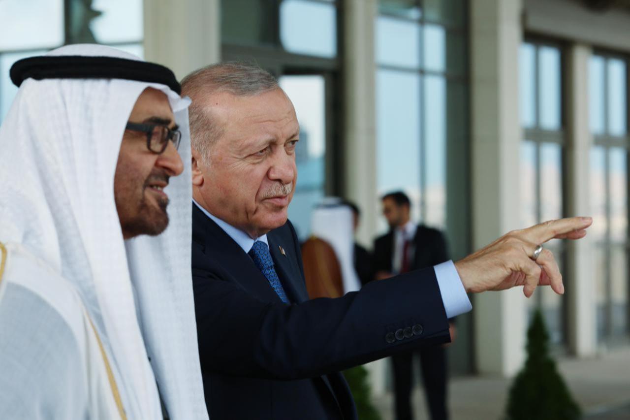 Turkish President Recep Tayyip Erdogan (R) and United Arab Emirates (UAE) President Sheikh Mohamed bin Zayed Al Nahyan (L) chat for a while on the balcony of the Presidential Complex after chairing the first meeting of Turkiye-UAE High-Level Strategic Council in Ankara, Türkiye on July 16, 2025. (AA Photo)