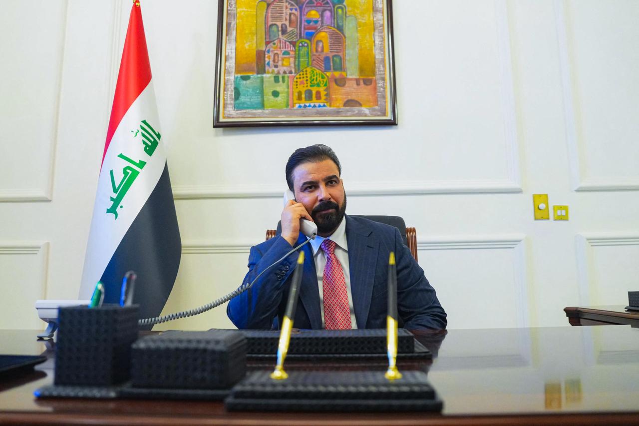 This handout photograph released by the Iraqi Prime Minister's Press Office on April 28, 2026 shows new prime minister-designate Ali al-Zaidi talking on the phone at his office in Baghdad, Iraq. (AFP Photo)