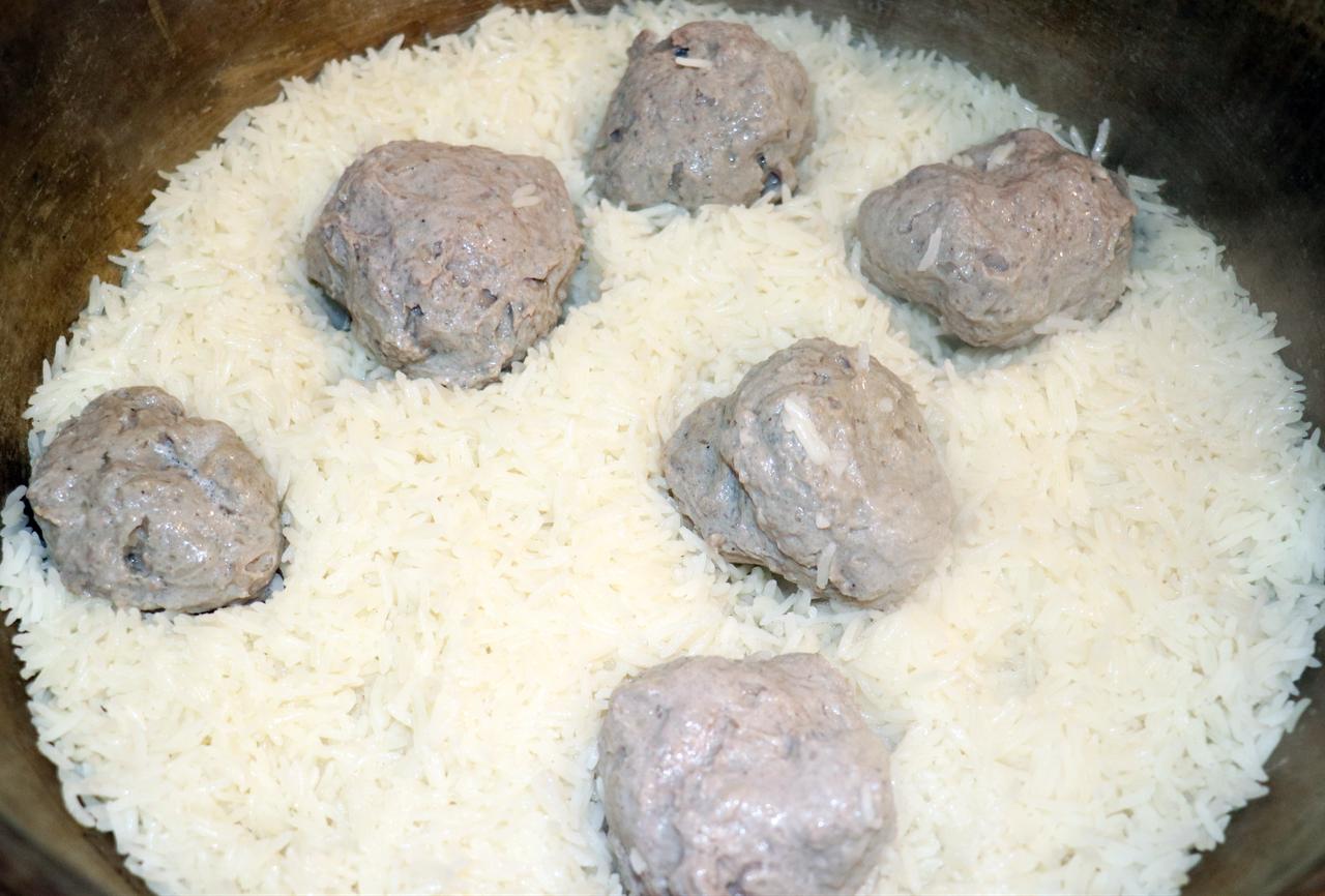 Large meatballs of Abdigor kofte are cooked with rice as part of the traditional preparation process in Dogubayazit, Agri, Türkiye, March 2026. (AA Photo)