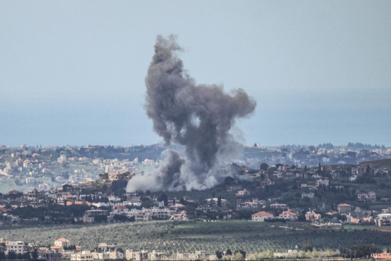 A photograph taken from the southern Lebanese area of Marjayoun shows smoke rising from the site of an Israeli airstrike that targeted the Lebanese village of Zawtar al-Charkiyeh on March 31, 2026. (AFP Photo)