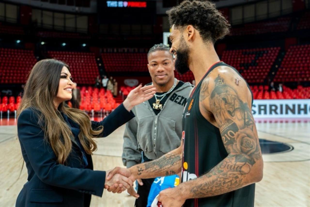 Kimberly Guilfoyle greets basketball players during a courtside visit in Anthes, Greece, February 9, 2026. (Photo via Facebook / @Kimberly Guilfoyle)