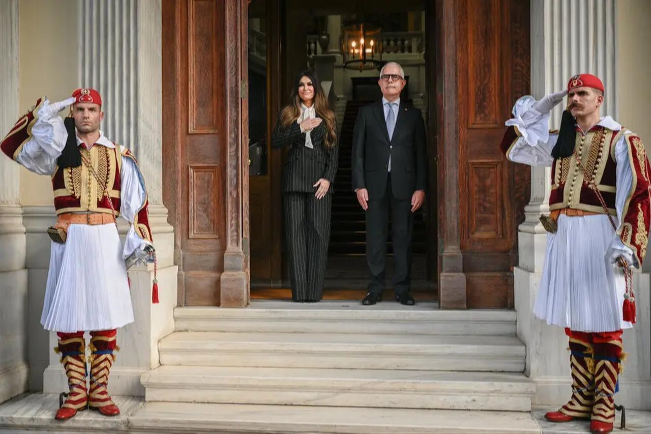 Ms. Guilfoyle and Dimitrios Zevelakis, who works for the Greek Foreign Ministry, during the credentials presentation ceremony, Athens, Greece, November 2025. (AFP Photo)