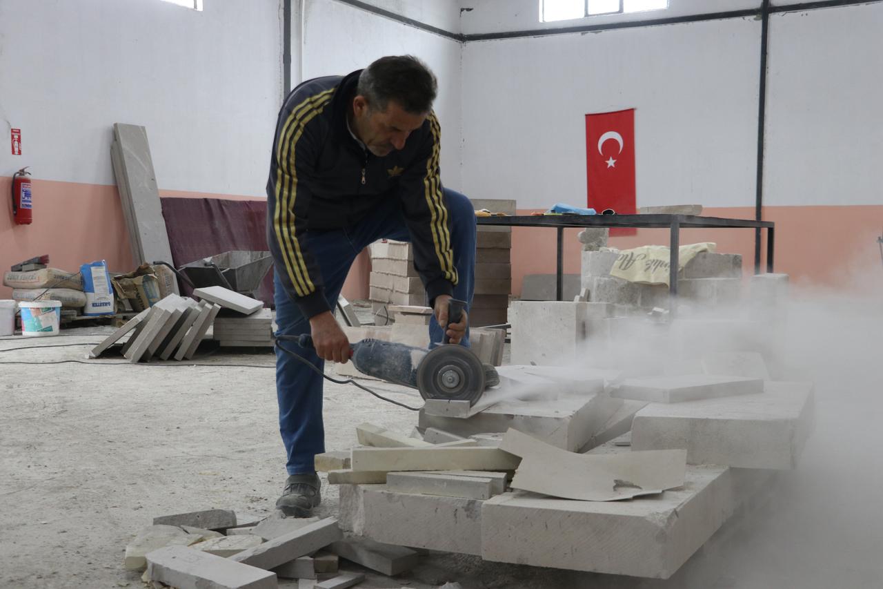 A workshop setting brings together generations to sustain the legacy of stone masonry. Kayseri, Türkiye, April 3, 2026. (AA Photo)
