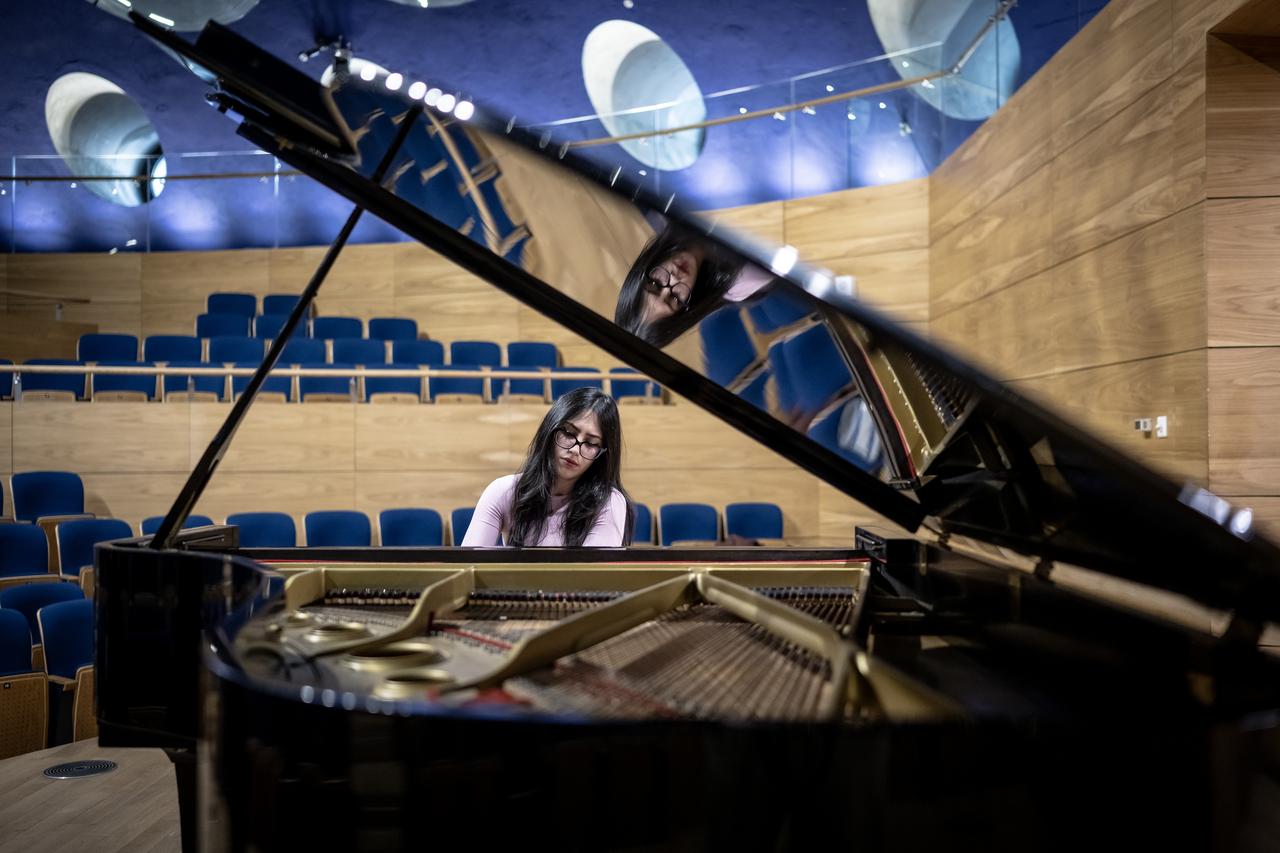 Turkish pianist Arya Su Gulenc is seen practicing at a concert hall ahead of upcoming international performances, Ankara, Türkiye, April 3, 2026. (AA Photo)