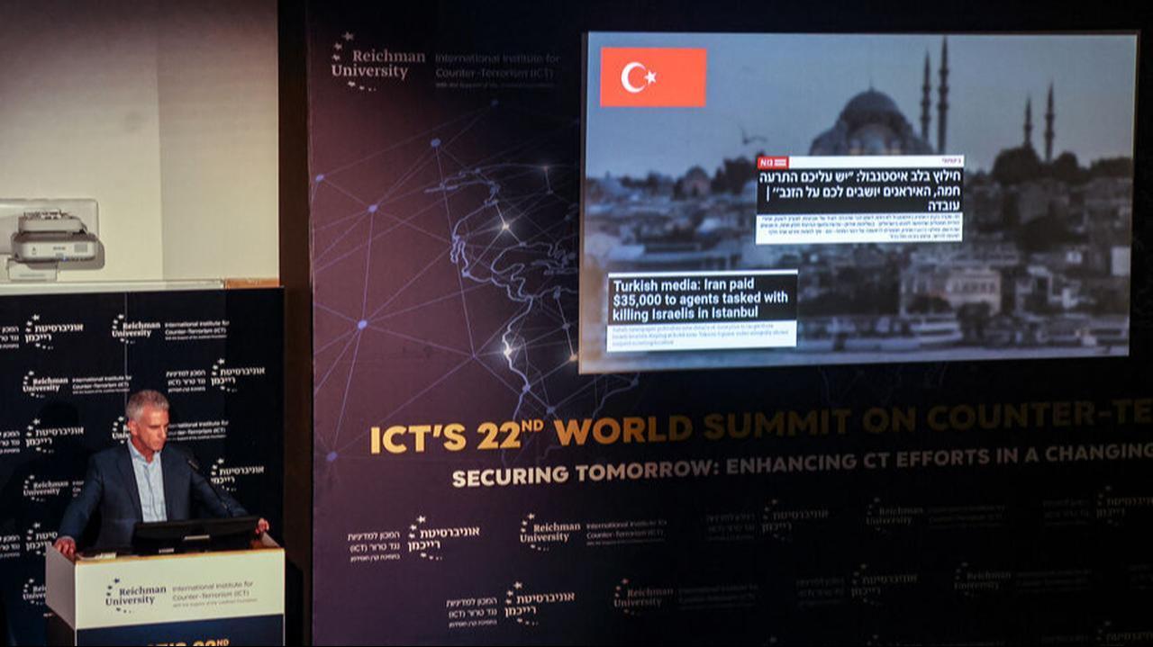 Israel's Mossad Director David Barnea speaks on the backdrop of a video during the International Institute for Counter-Terrorism (ICT) World Summit in Herzliya, Sept. 10, 2023. (AFP Photo)