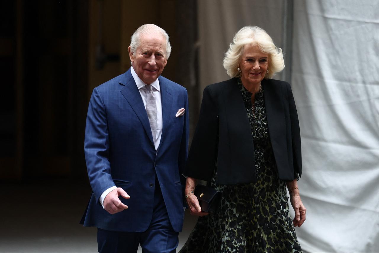 Britain's King Charles III and Queen Camilla cross the street from 30 Rockefeller Plaza as they arrive to attend the Greater Together Recepution, partner of King’s Trust in New York, US, April 29, 2026. (AFP Photo)