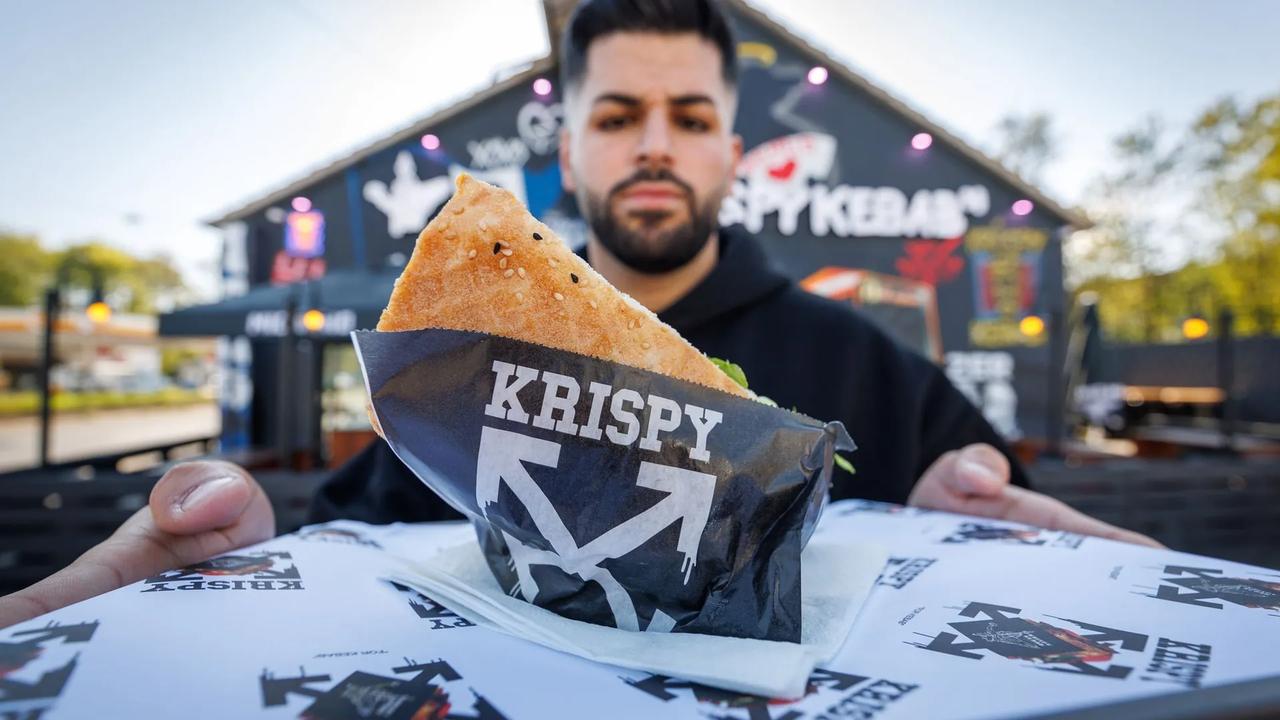 Sergen Kolcu, owner of German doner chain Krispy Kebab, presents one of the brand’s products outside a restaurant in Bielefeld, Germany, April 30, 2026. (dpa Photo)