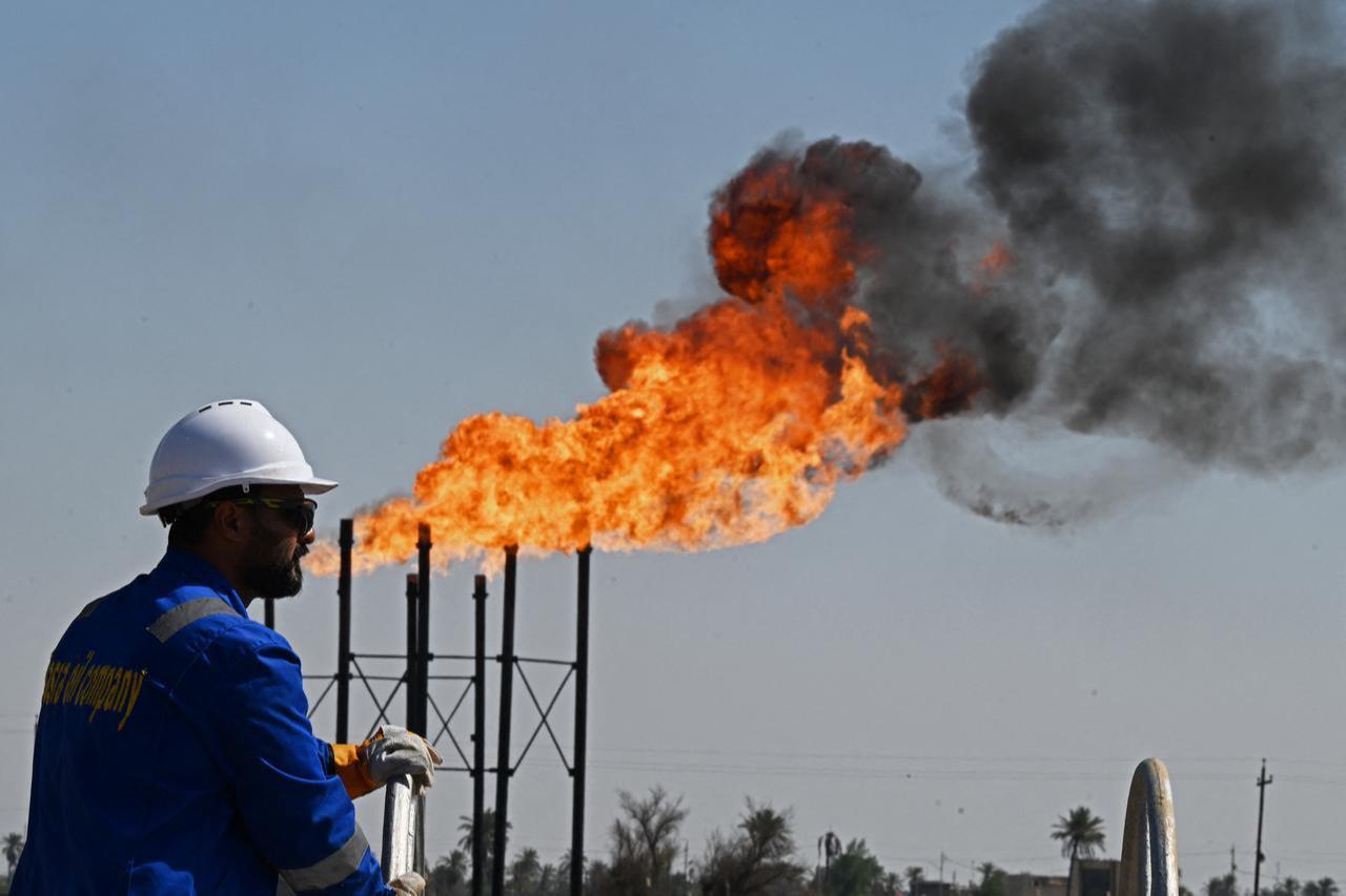 An employee of Basra Oil Company inspects the Nahr Bin Umar Oil and Gas Field on the outskirts of the southern Iraqi city of Basra, April 29, 2026. (AFP Photo)