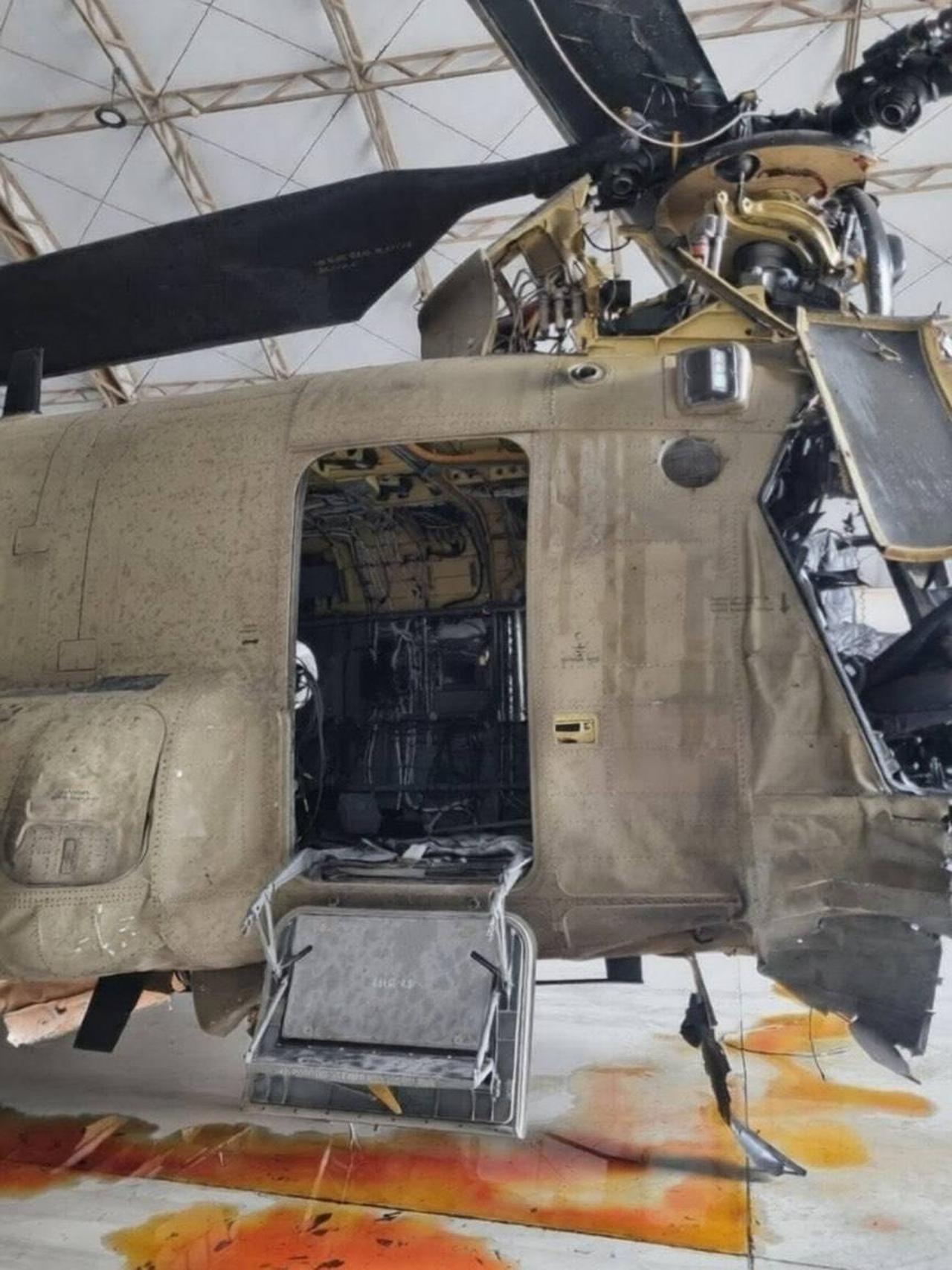 The photos show a US Chinook helicopter that was struck by an Iranian drone in Kuwait at an undisclosed time. (Photo via Telegram/@presstv)