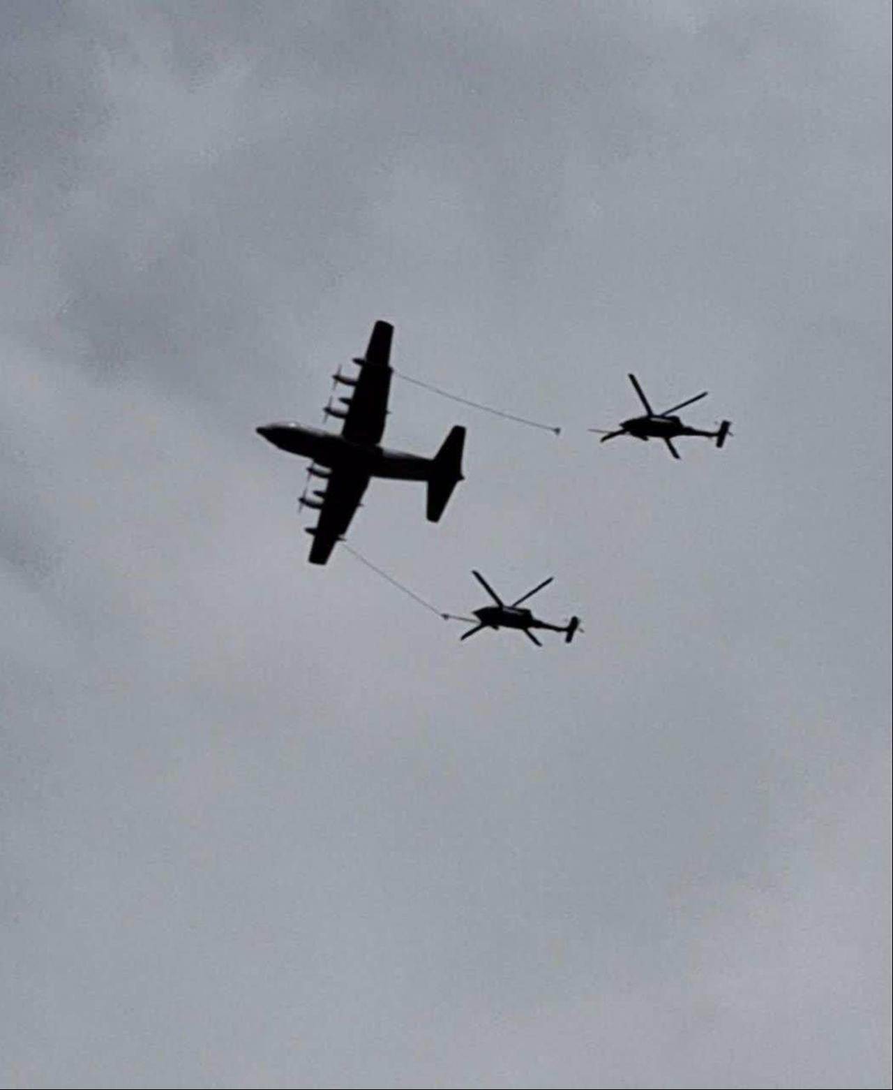 The photo shows a KC-130J Super Hercules aircraft during aerial refueling of two HH-60W Jolly Green II helicopters over Iran during CSAR operations for missing F-15E pilots. (Photo via Telegram)