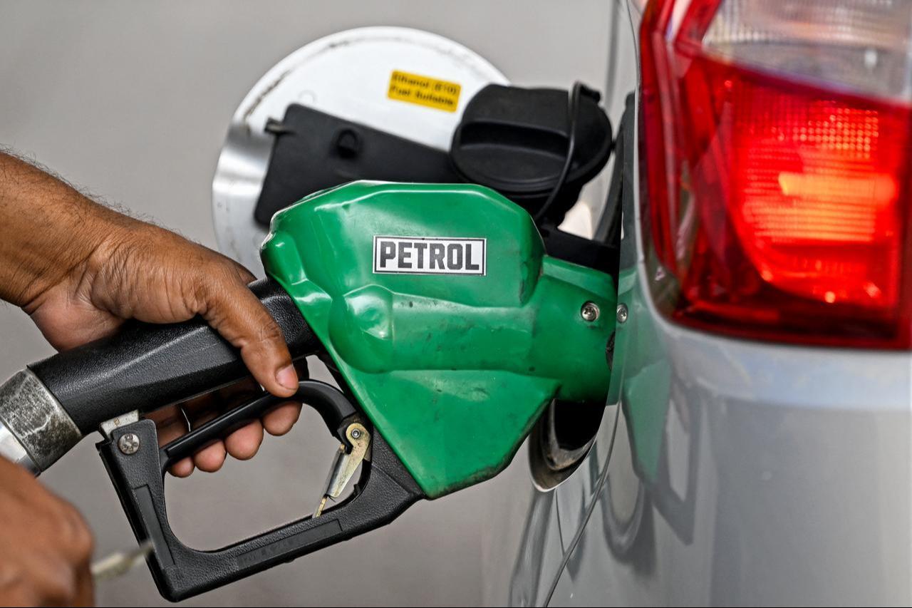 A petrol pump attendant refuels a vehicle at a Bharat Petroleum (BP) gas station in New Delhi, India on March 10, 2026. (AFP Photo)