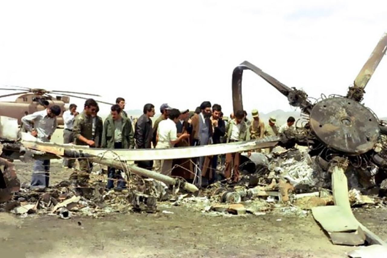 The photo shows a destroyed US military RH-53D Sea Stallion helicopter that crashed into a C-130 during Operation Eagle Claw, April 24th, 1980. (Photo via khamenei.ir)