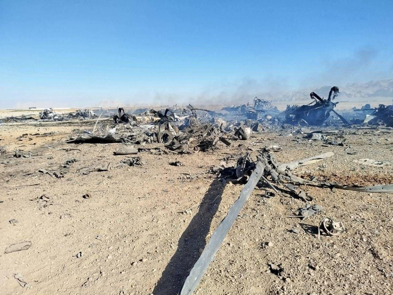 The photos show the aftermath of the scene where the US MC-130J "Commando II" and the MH-6 Little Bird helicopter were destroyed inside Iran during the rescue of a downed F-15E crew member. (Photo via Telegram/Tasnimnews)