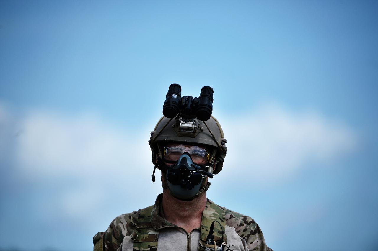 A pararescueman pauses after landing a high-altitude training jump from a C-17 Globemaster III over Francis S. Gabreski Air National Guard Base, N.Y., Aug. 30, 2016. (Photo via U.S. Air National Guard)
