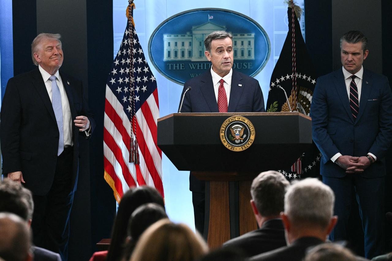 US President Donald Trump (L) looks on as CIA Director John Ratcliffe (C) speaks about the conflict in Iran in the James S. Brady Press Briefing Room of the White House in Washington, DC, on April 6, 2026. (AFP Photo)