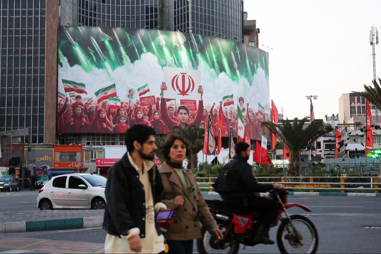 A view of gigantic poster as daily life continues despite the ongoing conflict in Tehran, Iran on April 1, 2026. (AA Photo)