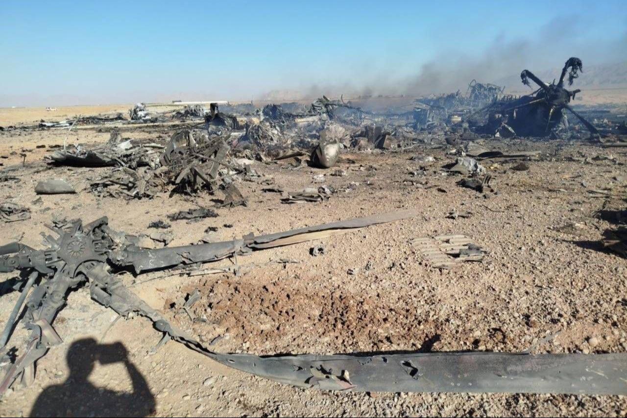 The photos show the aftermath of the scene where the US MC-130J "Commando II" and the MH-6 Little Bird helicopter were destroyed inside Iran during the rescue of a downed F-15E crew member. (Photo via Telegram/Tasnimnews)