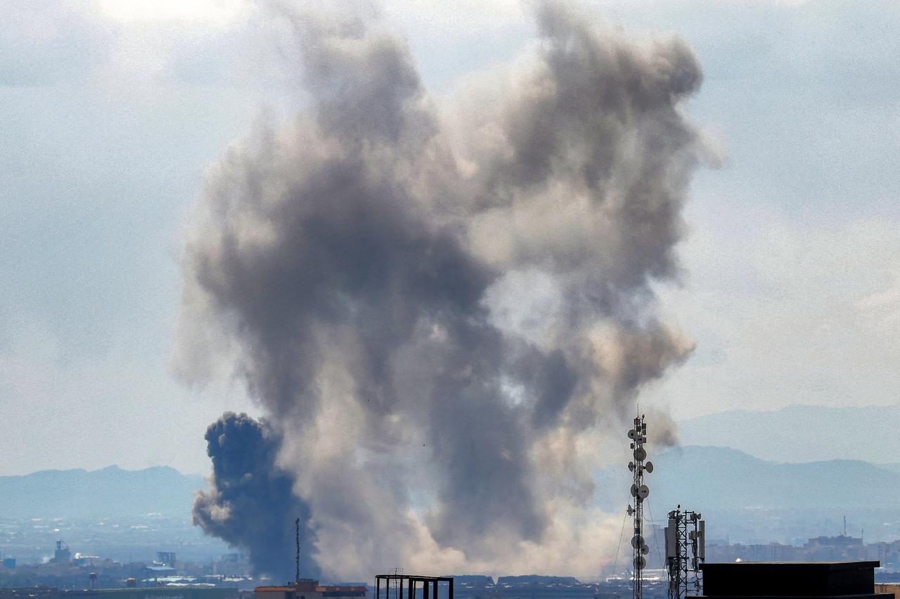 Smoke rises following strikes on Tehran on April 7, 2026. (AFP Photo)