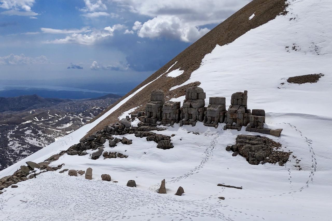 Snow crowns Mount Nemrut as stone giants welcome visitors