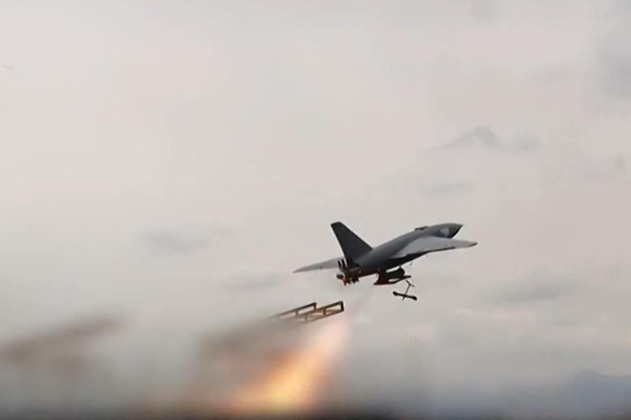 This grab taken from a video released by Iran's state broadcaster (IRIB) on April 6, 2026, shows a drone launched at US targets at Saudi Arabia's Al-Kharj base and Kuwait's Al-Adiri base. (AFP Photo)