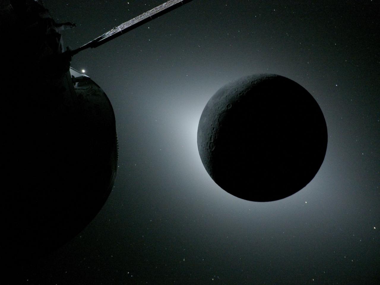 The Orion spacecraft (L) and the Moon backlit by the Sun during a solar eclipse on April 6, 2026. (AFP Photo)