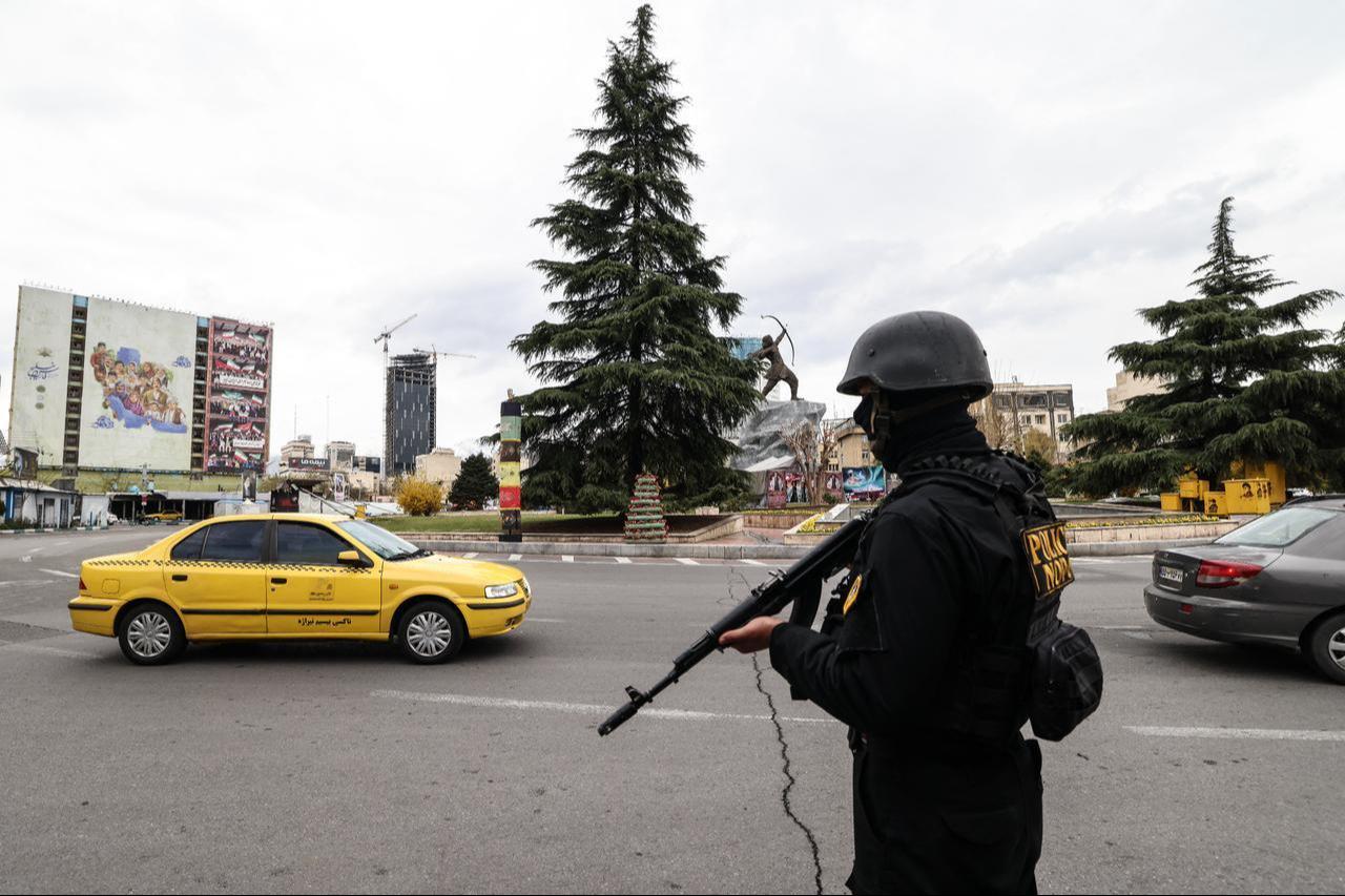 A member of the Iranian security forces stands guard in Tehran on March 31, 2026. (AFP Photo)