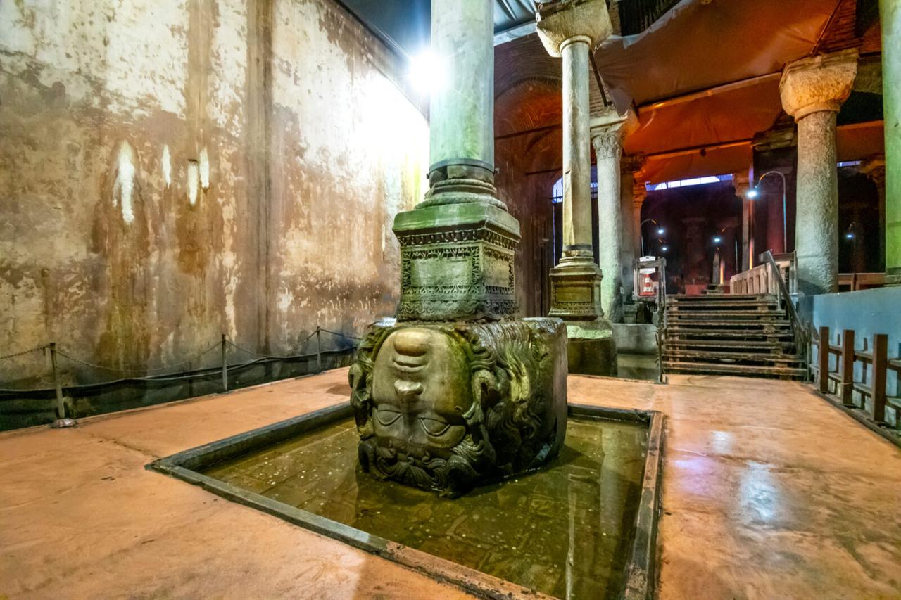 The upside-down stone Medusa head column in the ancient underground Basilica Cistern in the Sultanahmet district, Istanbul, Türkiye. (Adobe Stock Photo)