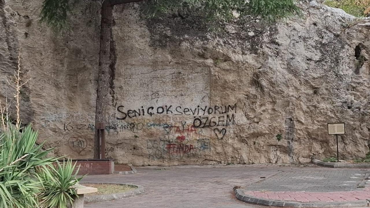 Recent examinations revealed that the surface and surroundings of the 1418 rock inscription had been vandalized with spray paint. The historically defaced ‘scribble board’ has now been carefully restored by the Ministry of Culture and Tourism. Amasya, Türkiye, April 6, 2026. (IHA Photo)