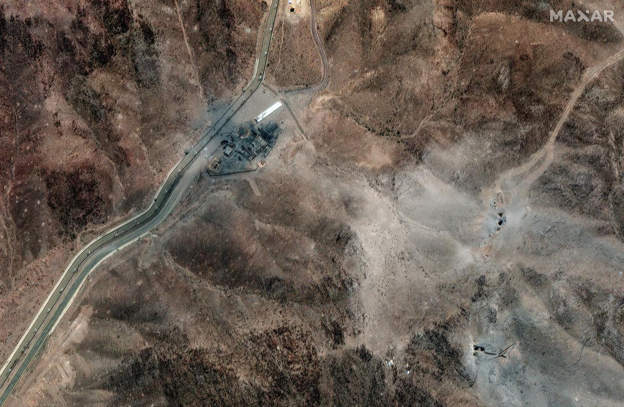 This satellite picture, taken on June 24, 2025, shows airstrike craters at the perimeter installation of Iran's Fordow Fuel Enrichment Plant (FFEP), northeast of the city of Qom. (Photo by Satellite image ©2025 Maxar Technologies/AFP)