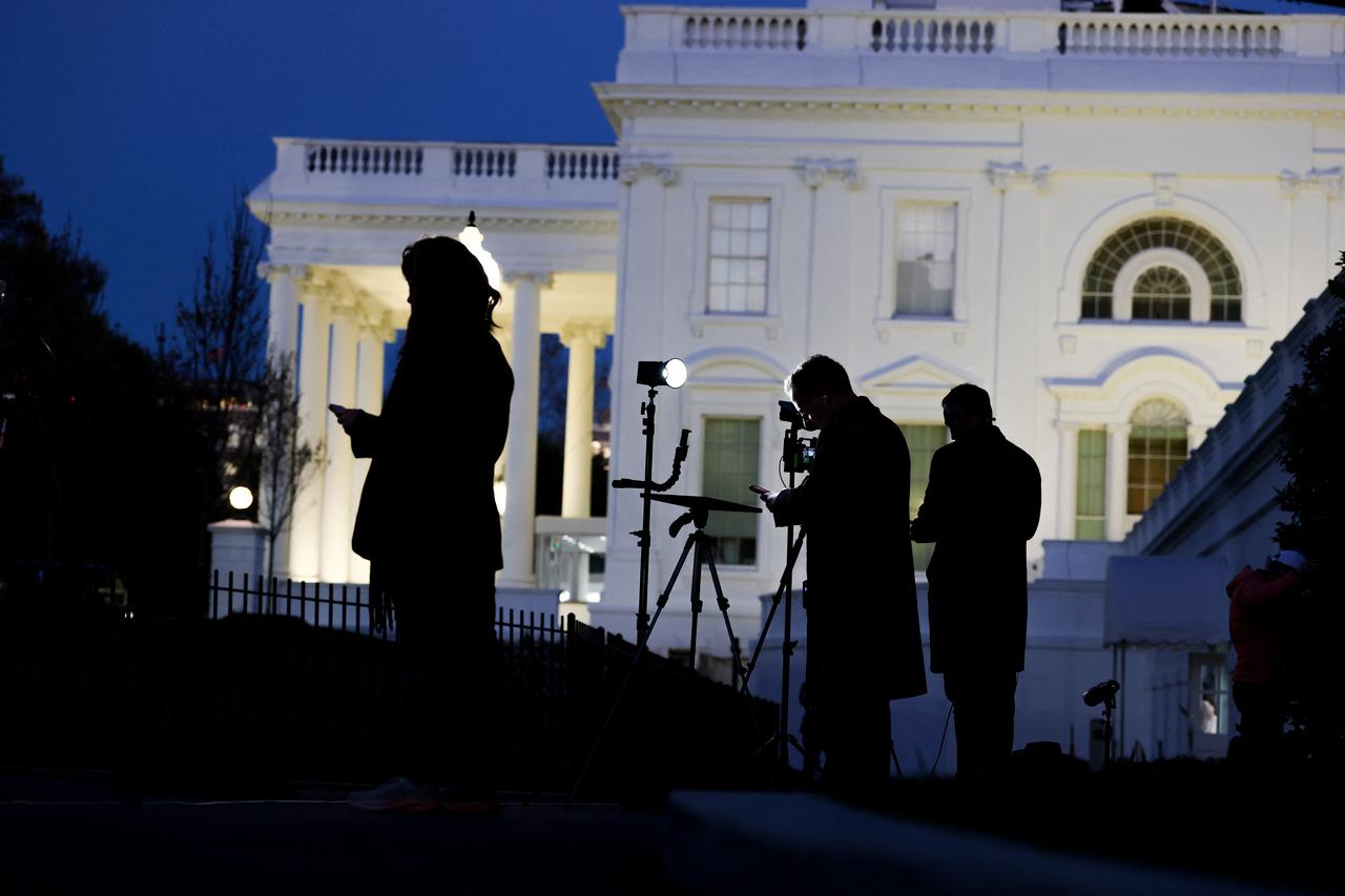 Reporters record themselves delivering news outside of the West Wing of the White House on April 07, 2026 in Washington, DC. (AFP Photo)