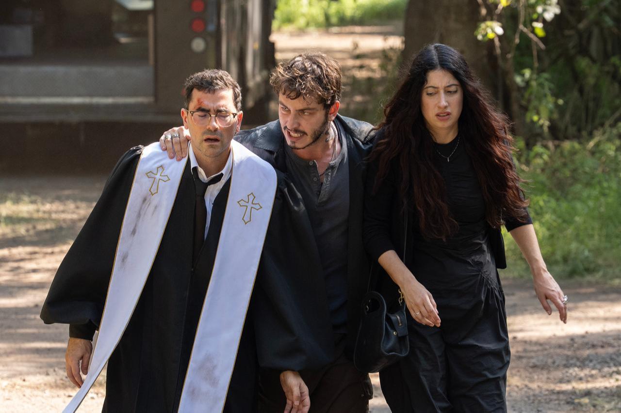 Dan Levy as Nicky, Boran Kuzum as Yusuf, and Taylor Ortega as Morgan appear in a scene of "Big Mistakes," March 13, 2026. (Courtesy of BKM)