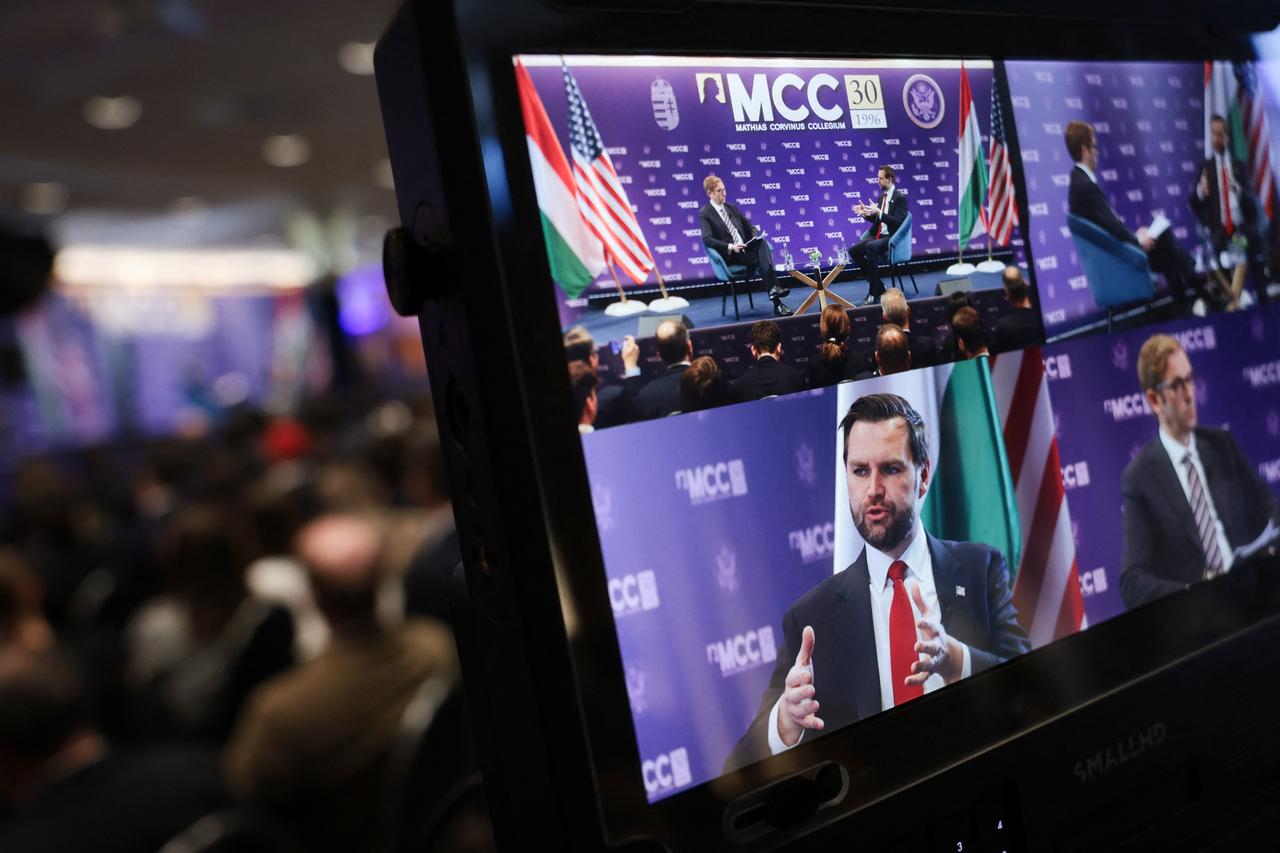 A screen displays US Vice President JD Vance as he delivers remarks at the Mathias Corvinus Collegium in Budapest on April 8, 2026. (AFP Photo)