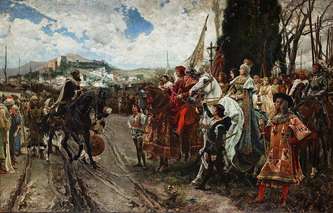 The last Muslim king of Granada, Abu Abdullah Muhammad XII, surrenders the city to Ferdinand and Isabella, marking the end of Muslim rule in Andalusia. (Image via Wikimedia)