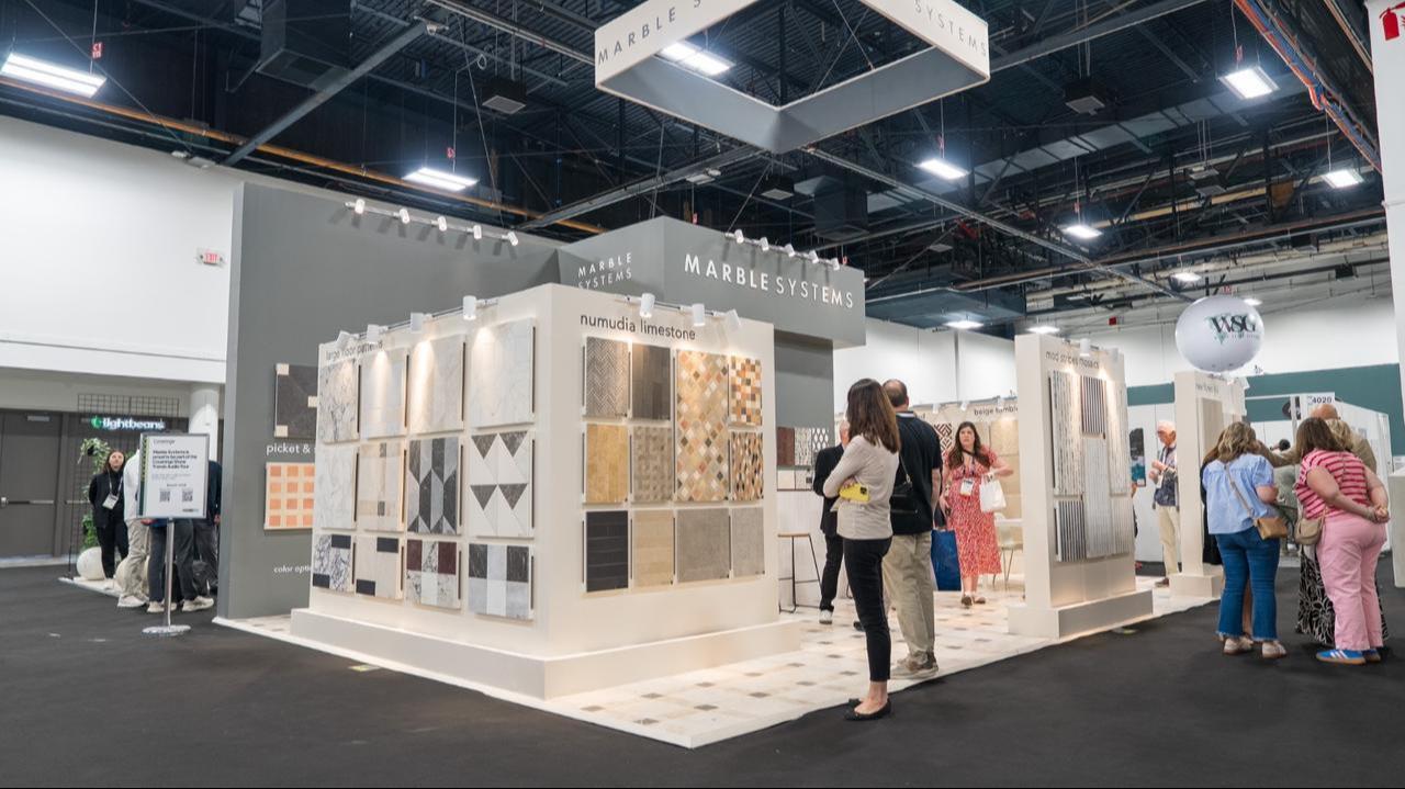 Visitors walk through the Marble Systems booth during the Coverings 2026 trade fair in Las Vegas, United States. (Courtesy of Marble Systems Tureks)